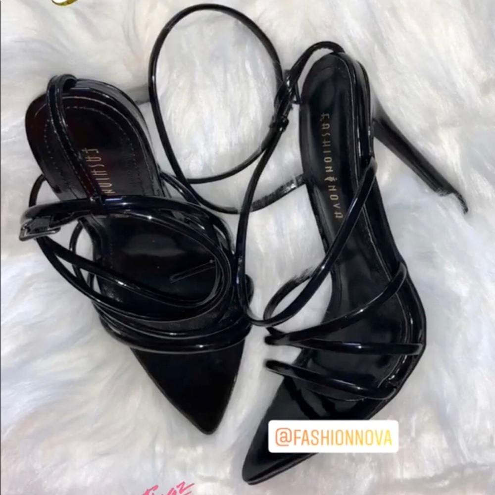 Pointed black high heels